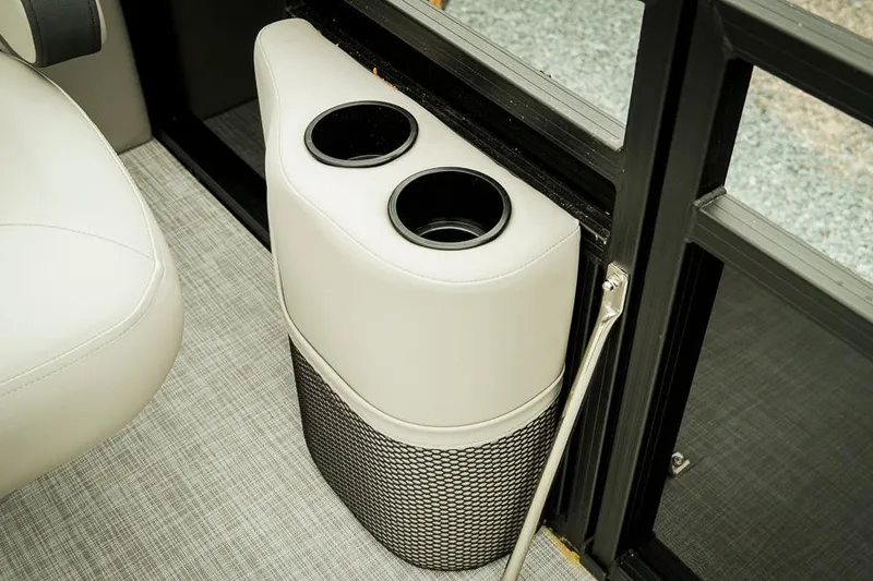 Slide: The Image of Cup holders and storage on 2026 Dockside 20DQ boat interior. - 17