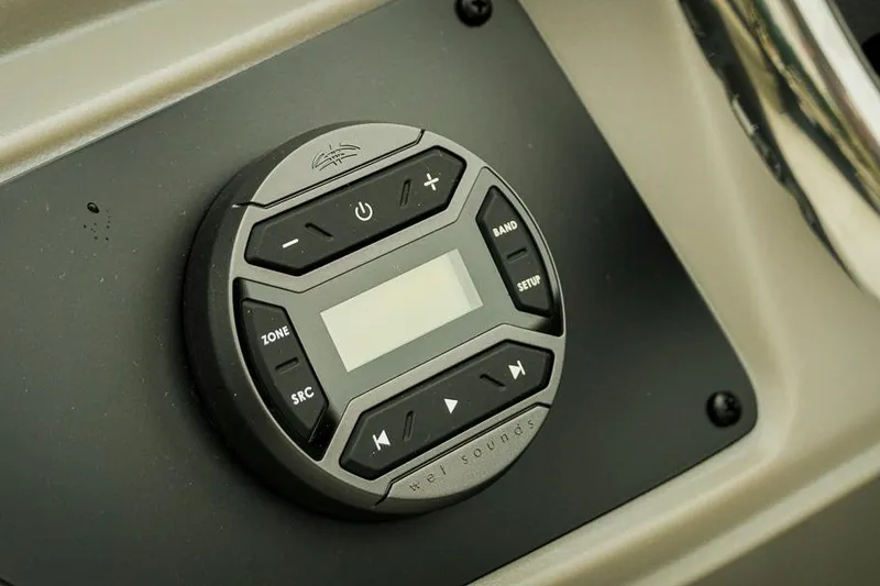 Slide: The Image of Close-up of a Dockside 20DQ 2026 audio control panel with buttons and display. - 20