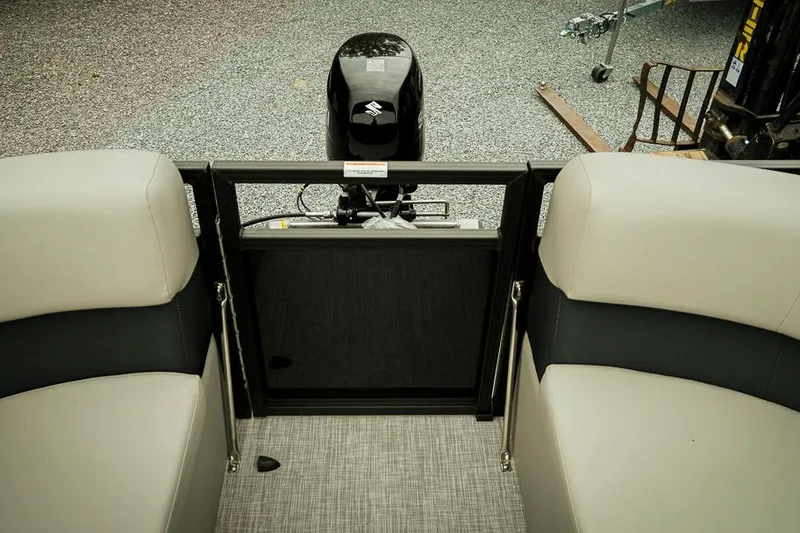 Slide: The Image of 2026 Dockside 20DQ boat interior with motor, featuring comfortable seating and modern design. - 23