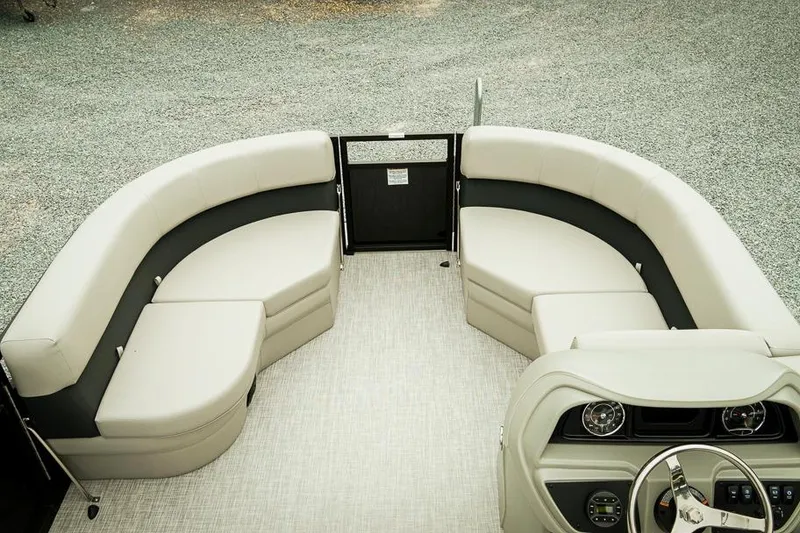 Slide: The Image of Luxurious interior of 2026 Dockside 20DQ boat with plush seating and modern dashboard. - 7
