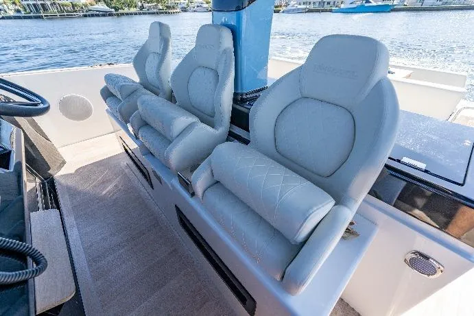 Slide: The Image of Luxury seating on 2025 Solaris Power 44 Open yacht, featuring elegant design and waterfront view. - 10