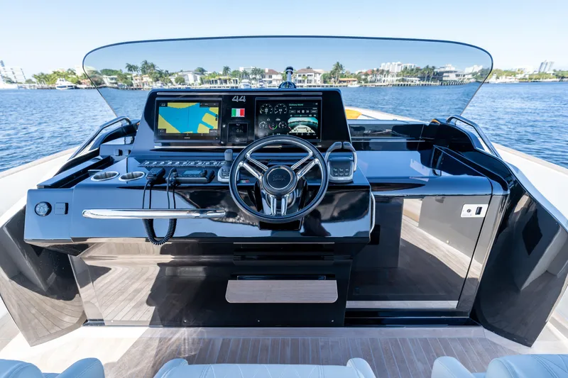 Slide: The Image of Helm of 2025 Solaris Power 44 Open yacht with advanced navigation systems and sleek design. - 11