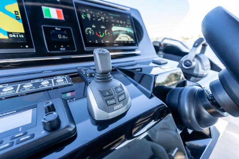 Slide: The Image of Control panel of 2025 Solaris Power 44 Open yacht with advanced navigation systems. - 13