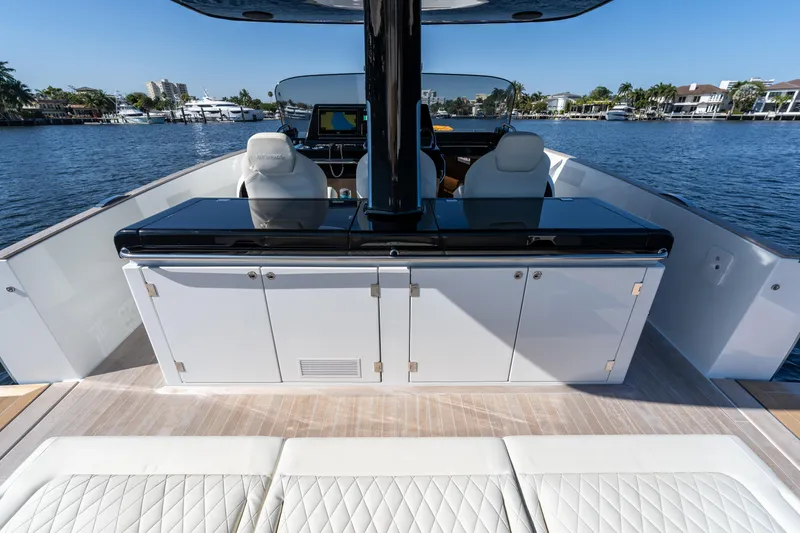 Slide: The Image of 2025 Solaris Power 44 Open yacht interior with sleek seating and modern design. - 16