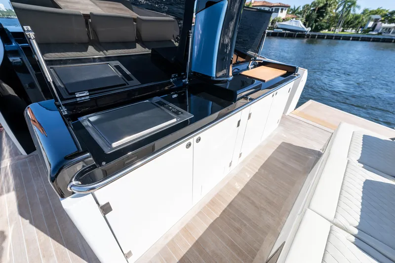 Slide: The Image of Outdoor kitchen on Solaris Power 44 Open yacht, 2025 model, with sleek design and waterfront view. - 17