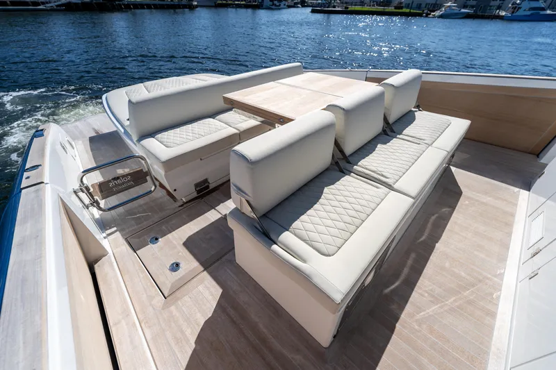 Slide: The Image of Luxurious seating area on the 2025 Solaris Power 44 Open yacht, featuring elegant design and waterfront views. - 23