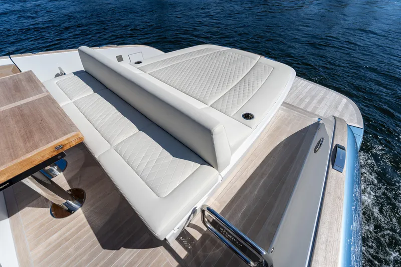 Slide: The Image of Luxurious seating on the 2025 Solaris Power 44 Open yacht, overlooking serene waters. - 26