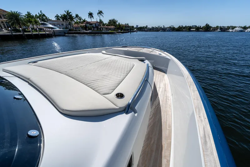 Slide: The Image of Luxurious 2025 Solaris Power 44 Open yacht with elegant deck design on serene water. - 33