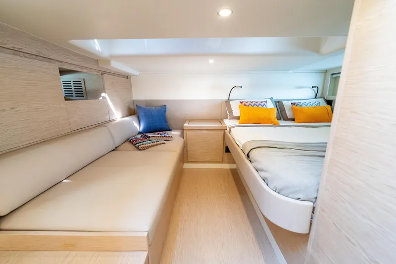 Slide: The Image of Luxurious interior of 2025 Solaris Power 44 Open yacht with modern design and cozy bedding. - 40