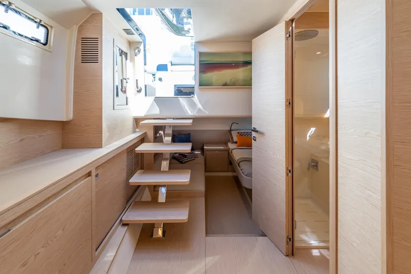 Slide: The Image of Luxurious interior of 2025 Solaris Power 44 Open yacht, featuring modern design and wooden finishes. - 42