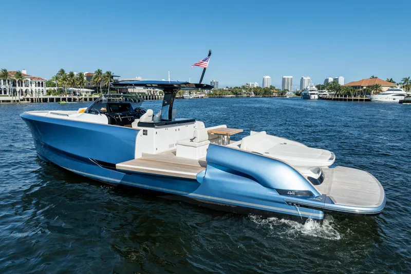 Slide: The Image of 2025 Solaris Power 44 Open yacht cruising on a sunny waterfront. - 46