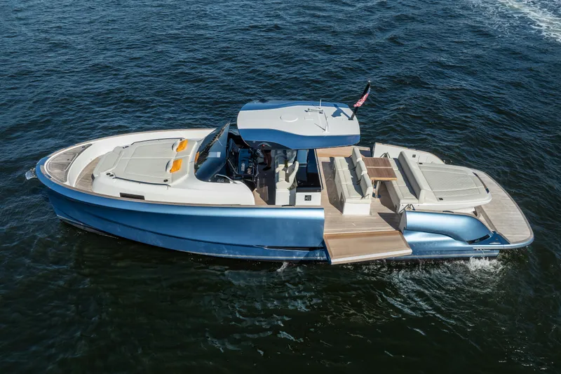 Slide: The Image of 2025 Solaris Power 44 Open yacht cruising on open water, showcasing sleek design and luxury features. - 47