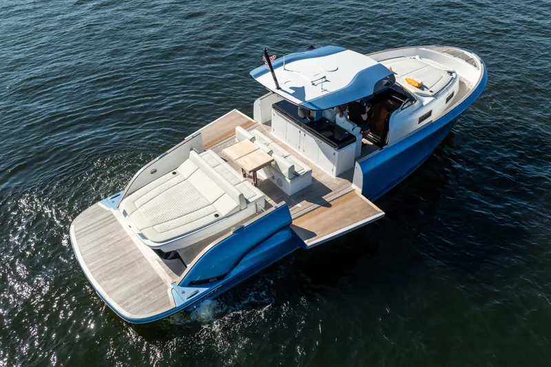 Slide: The Image of 2025 Solaris Power 44 Open yacht on water, featuring sleek design and spacious deck. - 7