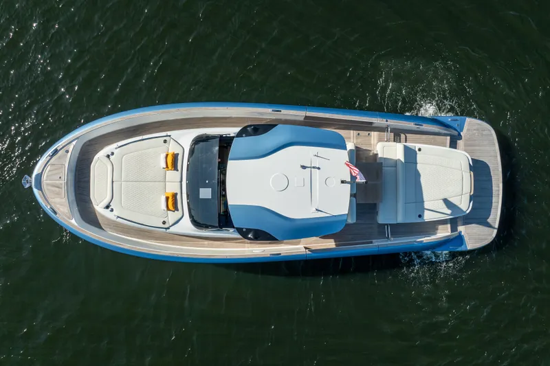Slide: The Image of Aerial view of 2025 Solaris Power 44 Open yacht cruising on water. - 9