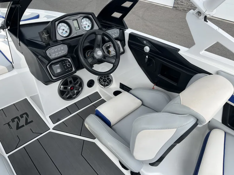 Slide: The Image of Interior of a 2019 Axis T22 boat with modern dashboard. - 16
