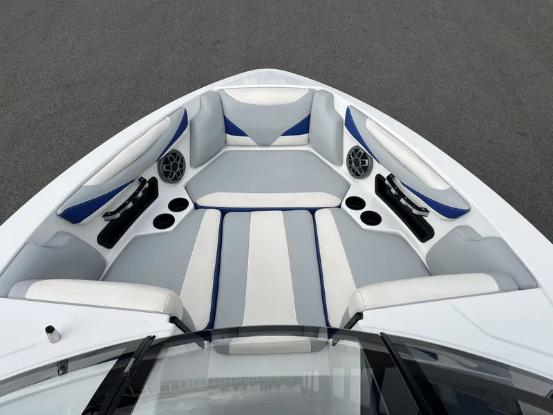 Slide: The Image of Interior of 2019 Axis T22 boat with blue and white seating. - 19