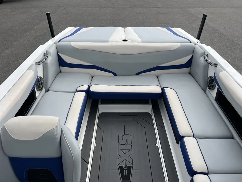 Slide: The Image of Interior of a 2019 Axis T22 boat with blue and gray seating. - 20