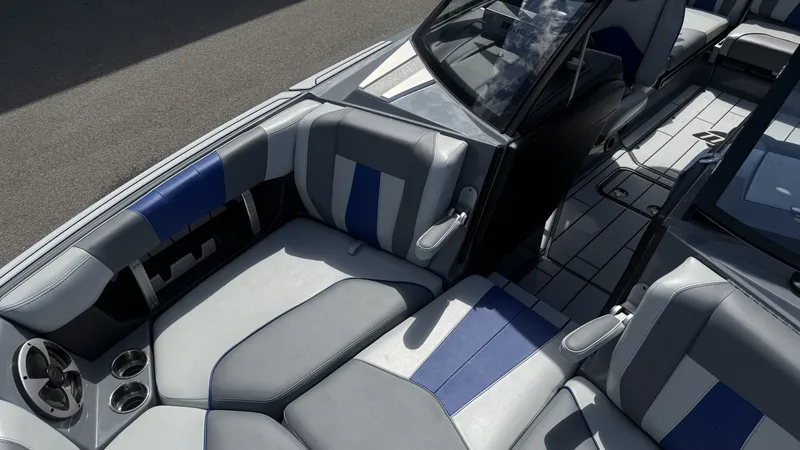 Slide: The Image of Interior of 2020 Malibu Wakesetter 23 MXZ with blue and gray seating. - 14