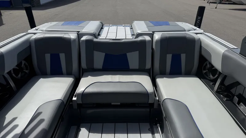 Slide: The Image of Interior of 2020 Malibu Wakesetter 23 MXZ with gray and blue seating. - 15