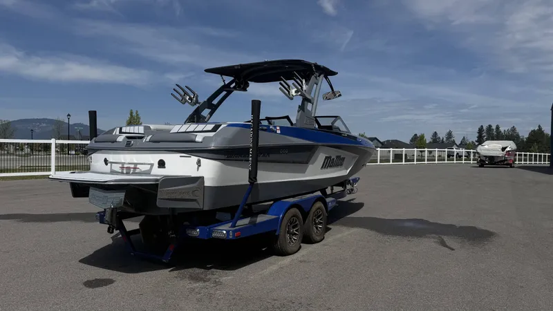 Slide: The Image of 2020 Malibu Wakesetter 23 MXZ on trailer, blue sky. - 6