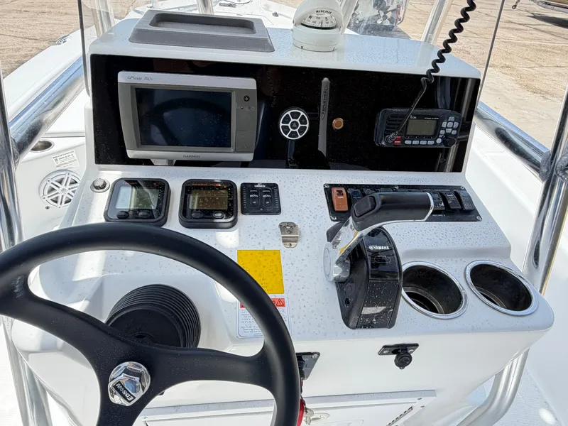 Slide: The Image of BlackJack 224 boat console, 2011 model, featuring navigation and control systems. - 11
