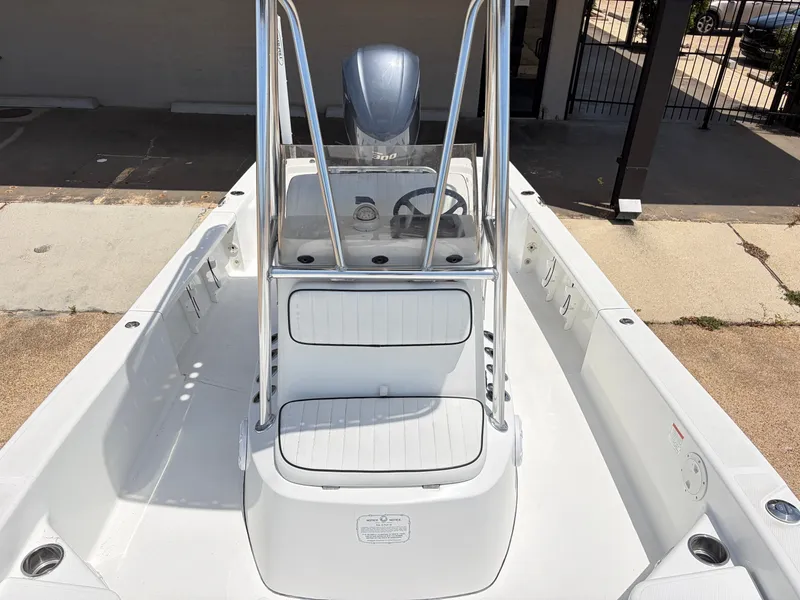 Slide: The Image of 2011 BlackJack 224 boat with console and seating area. - 15