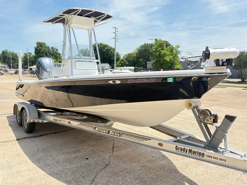 Slide: The Image of Black BlackJack 224 boat from 2011 on a trailer. - 3