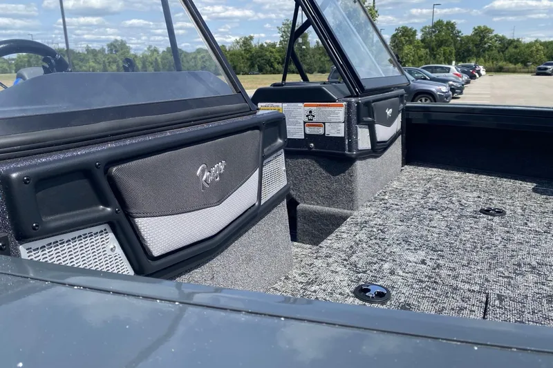 Slide: The Image of 2026 Ranger VX1788 WT boat interior with dashboard and seating area. - 6