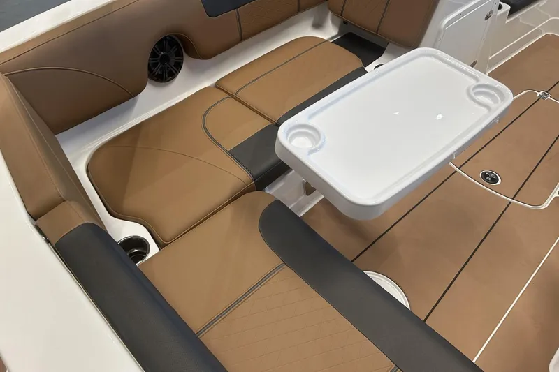 Slide: The Image of Luxurious interior of 2026 Tahoe 1950 boat with tan seating and white table. - 112