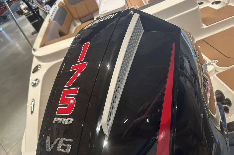 Slide: The Image of Mercury 175 Pro V6 engine on a 2026 Tahoe 1950 boat, interior view. - 4