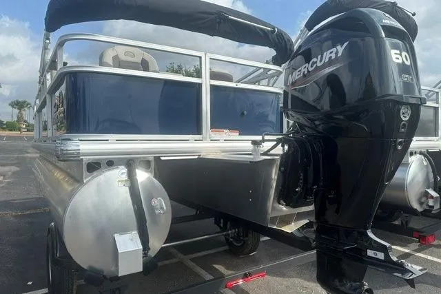 Slide: The Image of 2026 Sun Tracker Bass Buggy 18 DLX pontoon boat with Mercury 60 HP engine. - 4