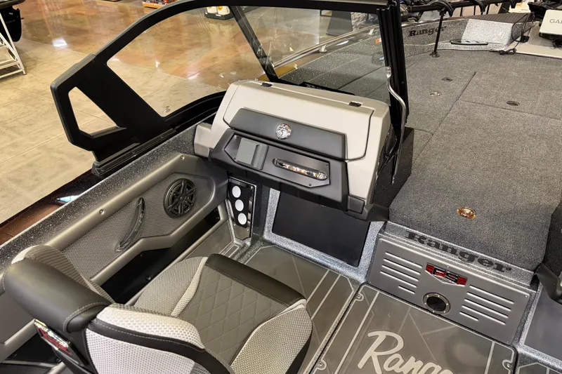 Slide: The Image of 2026 Ranger 621FS Cup-Equipped boat interior with modern dashboard and seating. - 6