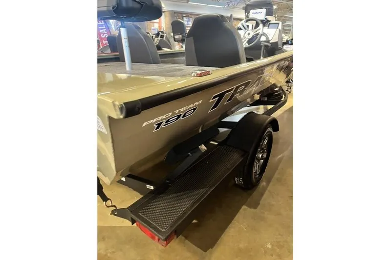 Slide: The Image of 2026 Tracker Pro Team 190 boat on display in showroom. - 6