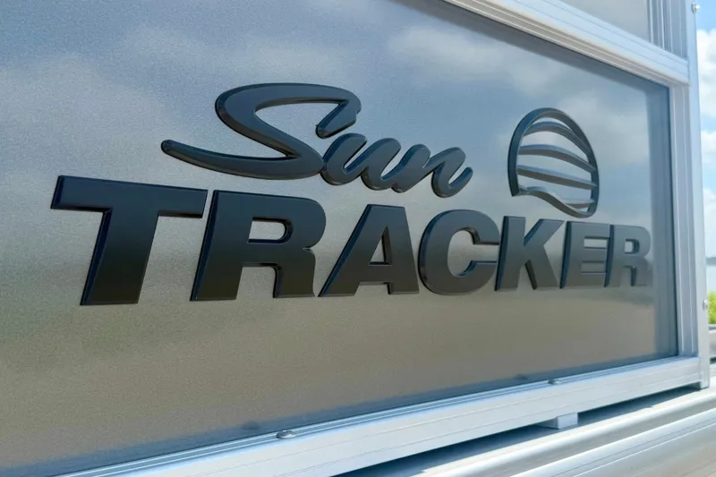 Slide: The Image of Sun Tracker Bass Buggy 16 XL Select 2026 logo on metallic surface. - 12