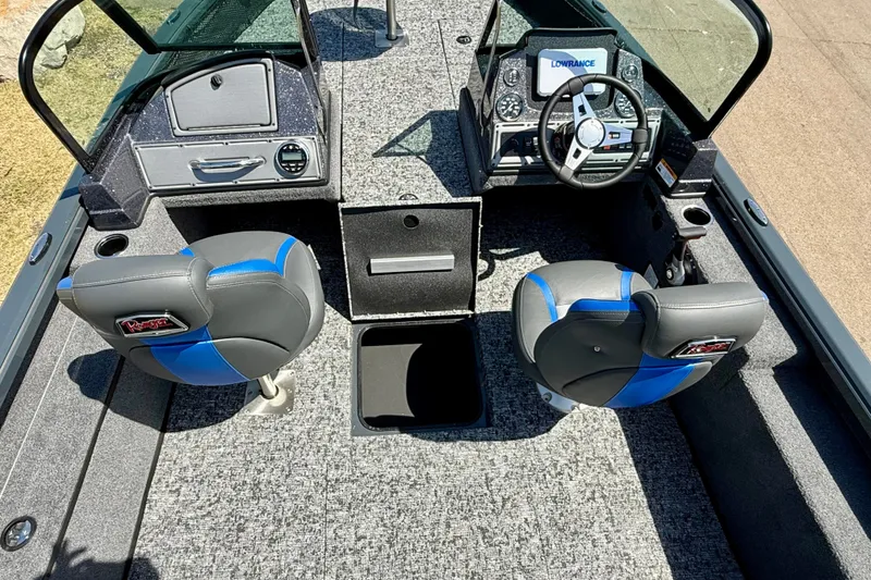 Slide: The Image of 2026 Ranger VS1782SC Reata boat interior with steering console and seating. - 11