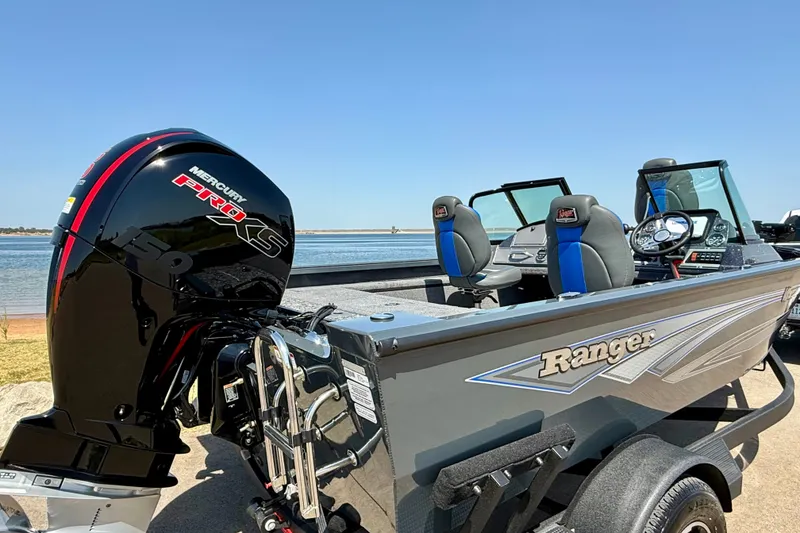 Slide: The Image of 2026 Ranger VS1782SC Reata boat with Mercury Pro XS engine by a lake. - 16