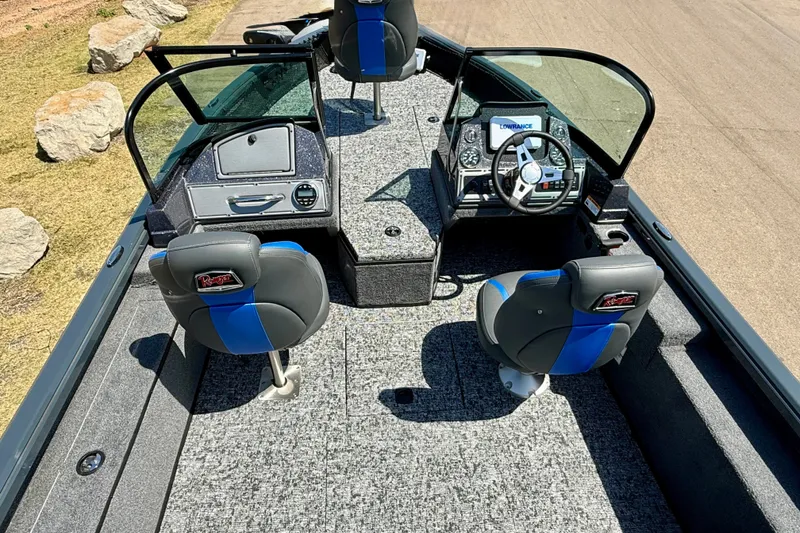Slide: The Image of 2026 Ranger VS1782SC Reata boat interior with steering console and seating. - 10