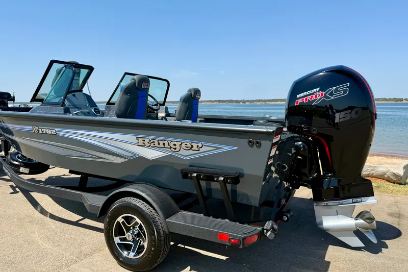 The Image of 2026 Ranger VS1782SC Reata boat with Mercury Pro XS engine by the water. - 15