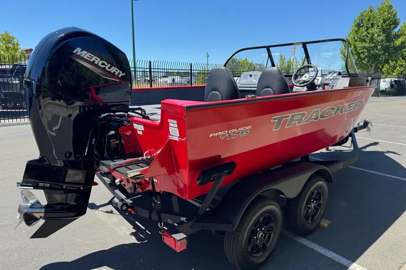 Slide: The Image of 2026 Tracker Pro Guide V-175 WT boat with Mercury engine on trailer. - 4