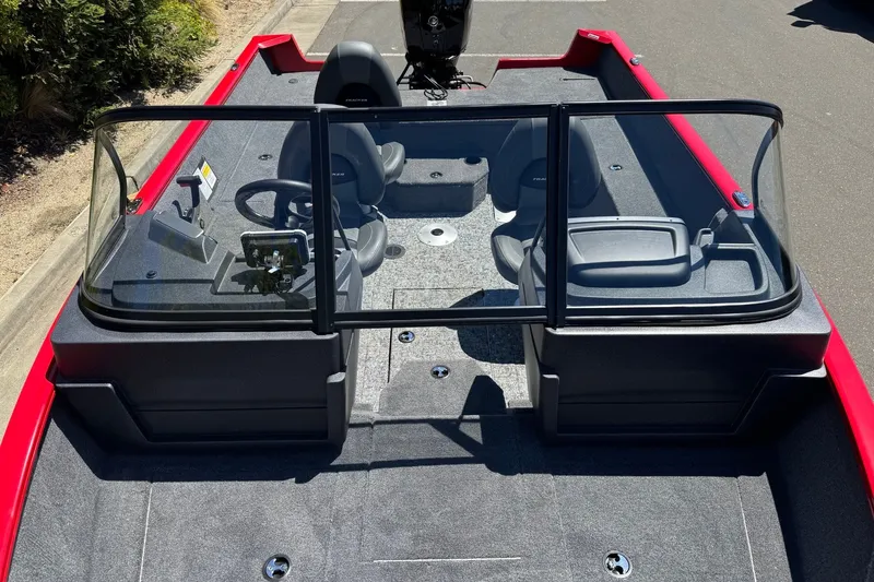 Slide: The Image of 2026 Tracker Pro Guide V-175 WT boat interior with dual consoles and seating. - 9