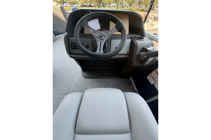 Slide: The Image of Steering console of 2026 Sun Tracker SportFish 20 DLX pontoon boat. - 4
