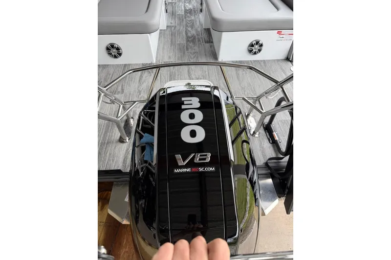 Slide: The Image of 2026 Crest Caribbean 250 SLRC boat with V8 engine, sleek interior design. - 4
