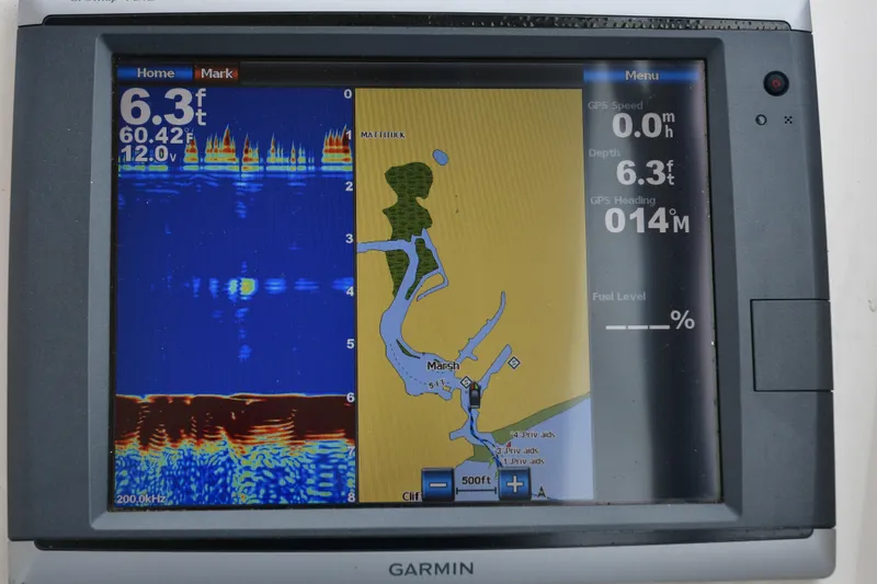 Slide: The Image of Garmin marine GPS display on 2013 Grady-White Freedom 275 boat, showing depth and map. - 8