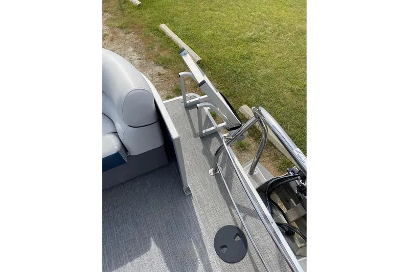 Slide: The Image of 2022 Godfrey Sweetwater 2286 SBX pontoon boat deck with seating and railing. - 11