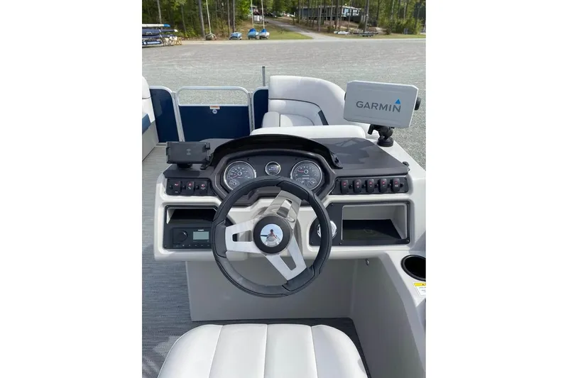 Slide: The Image of 2022 Godfrey Sweetwater 2286 SBX boat dashboard with Garmin navigation system. - 7