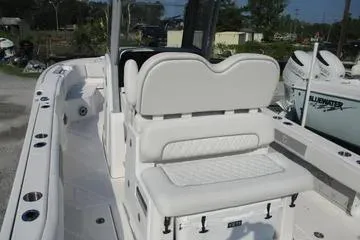Slide: The Image of 2026 Sea Fox 282 Hybrid LT boat interior with seating and storage features. - 15