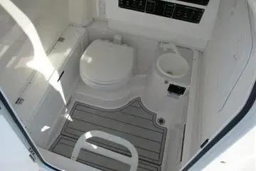 Slide: The Image of 2026 Sea Fox 282 Hybrid LT boat interior with toilet and sink. - 19