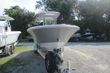 Slide: The Image of 2026 Sea Fox 282 Hybrid LT boat on trailer, parked outdoors. - 5