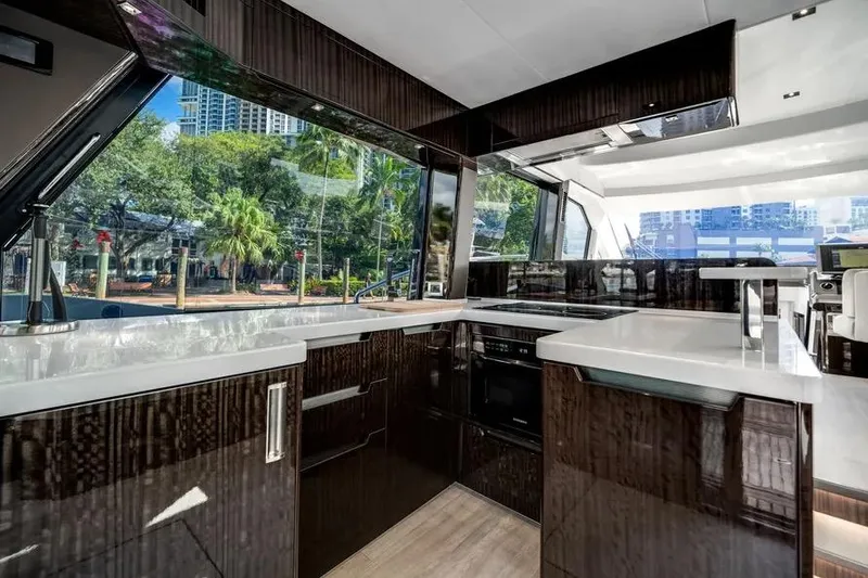 Slide: The Image of Luxurious interior of 2024 Galeon 500 Fly yacht with modern kitchen design. - 22
