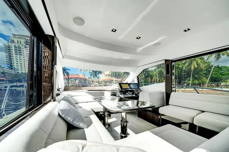 Slide: The Image of Luxurious interior of 2024 Galeon 500 Fly yacht with panoramic windows and modern seating. - 28
